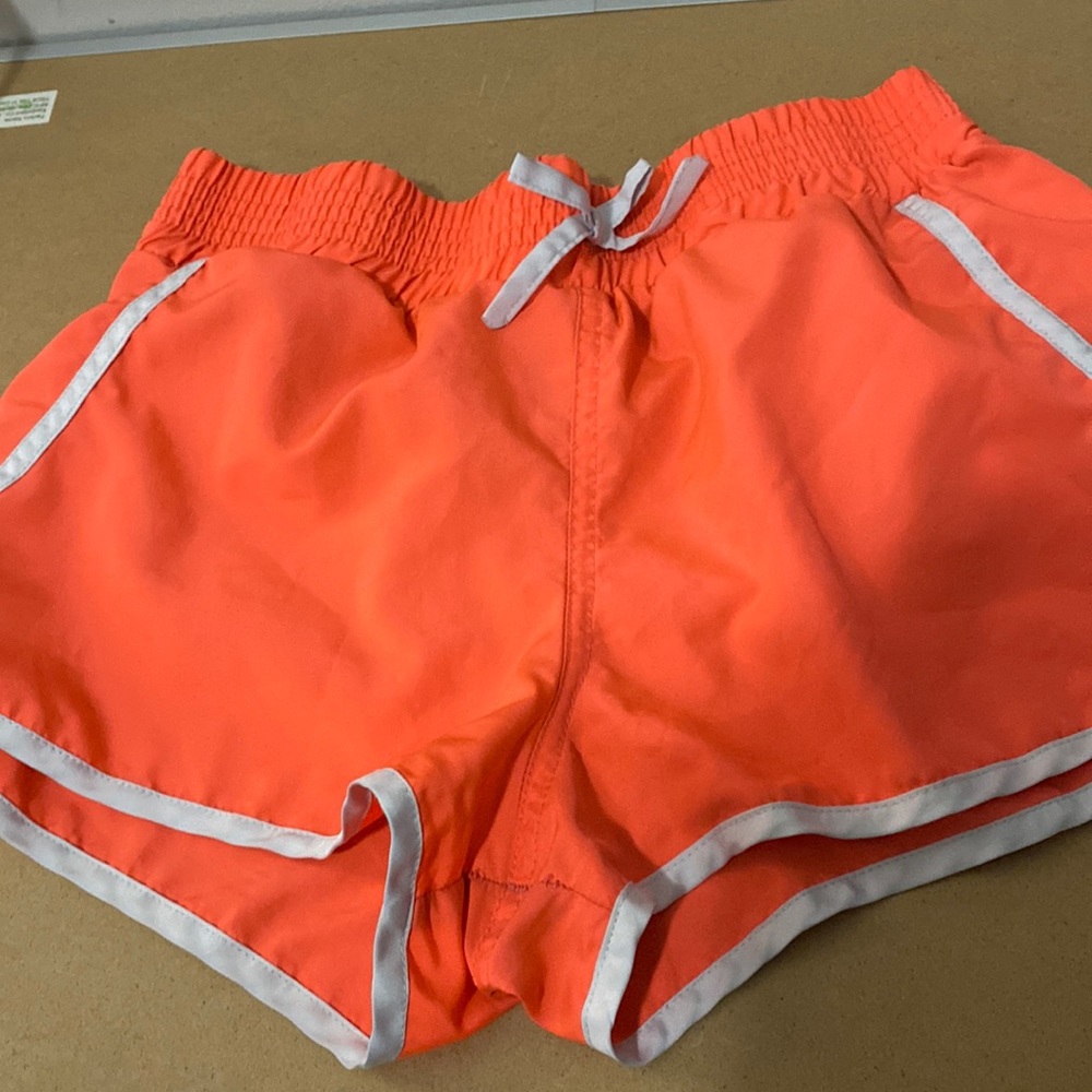 Pinkish orange shorts